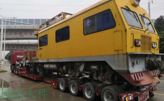 四橋平板挖機運輸車圖片